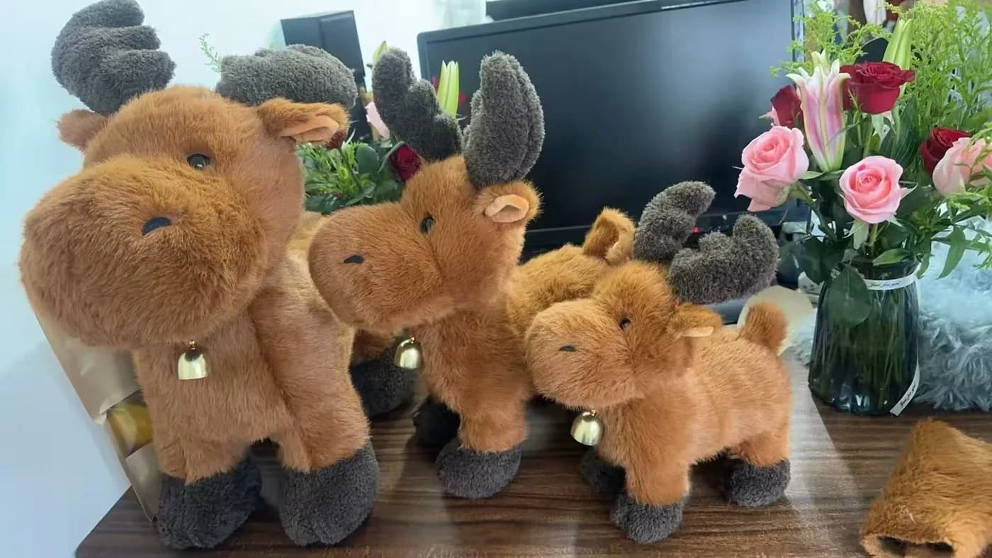 Reindeer plush toys in three sizes with hangtags attached