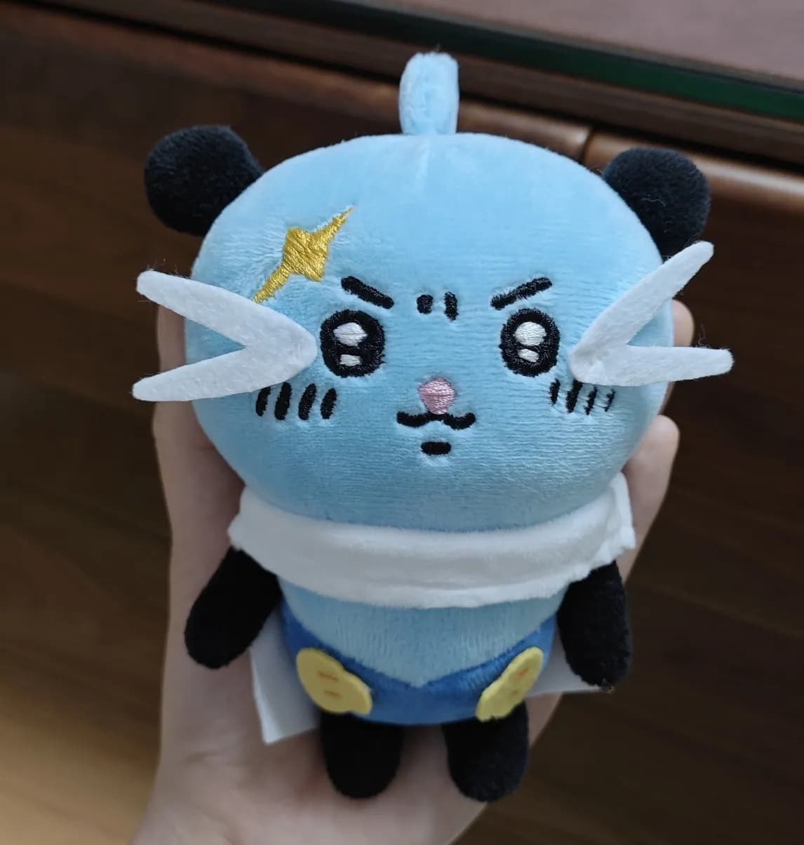 Blue cat game character plush with wire whiskers