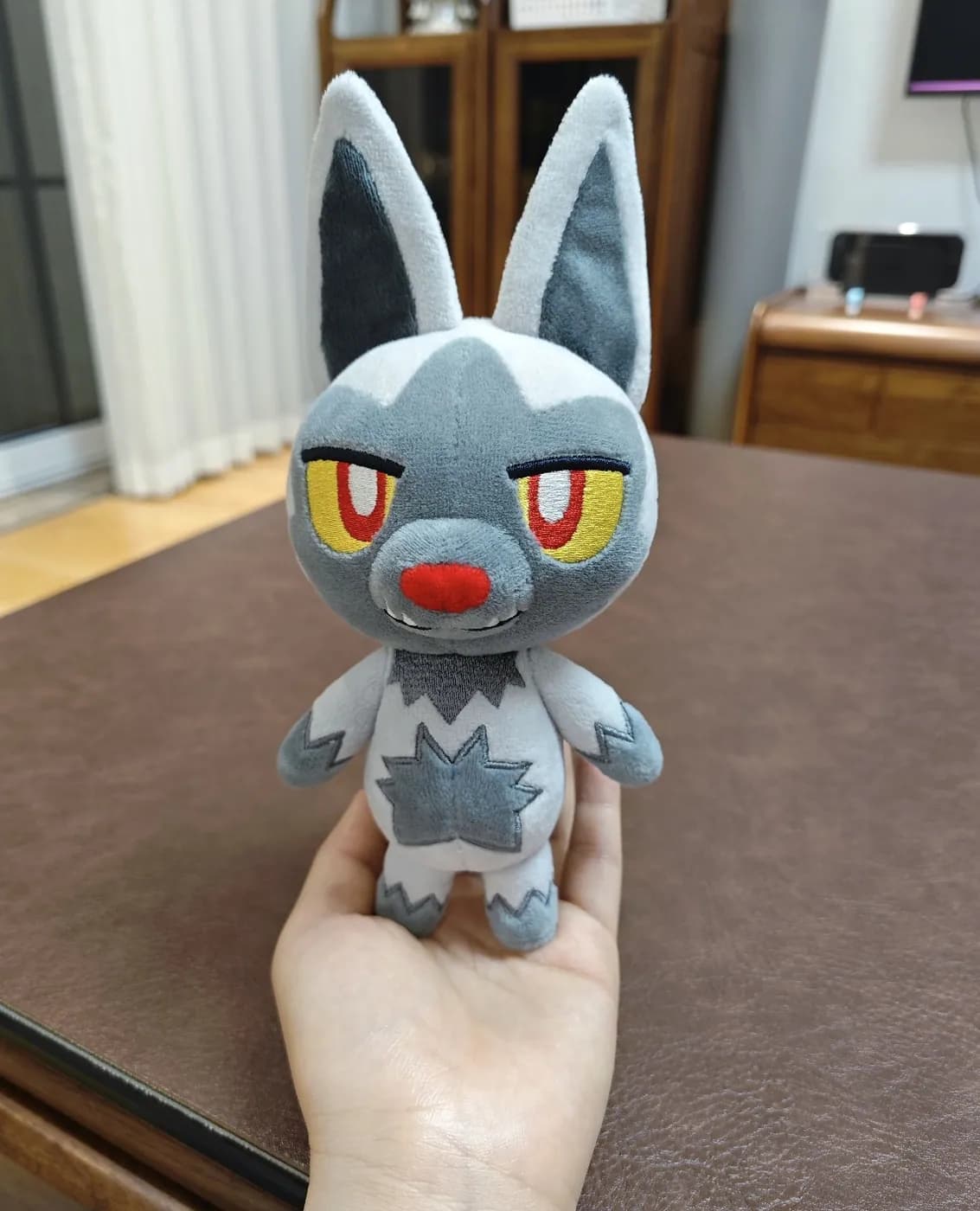 Blue lynx game character plush with appliqué markings