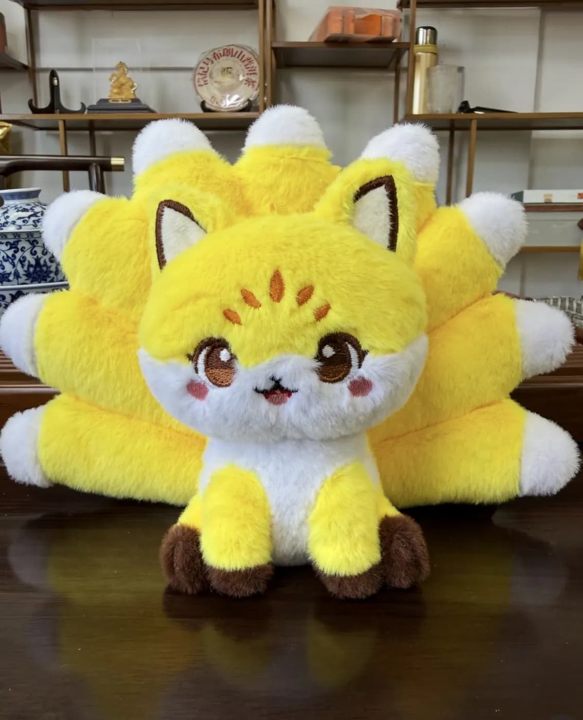 Nine-tailed fox character plush with layered tail panels