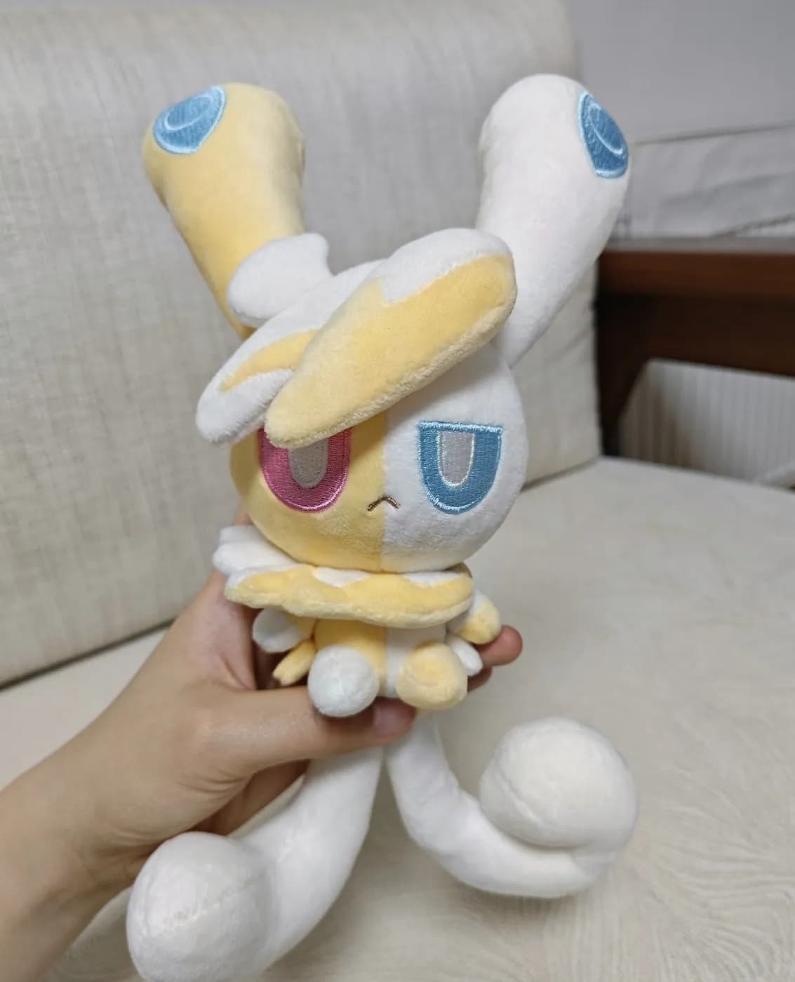 White rabbit game character plush with long ears and printed eyes