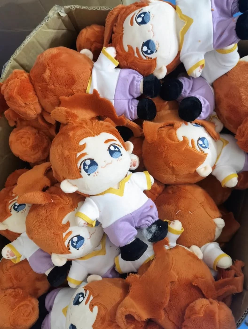 Production run of character dolls waiting for final inspection