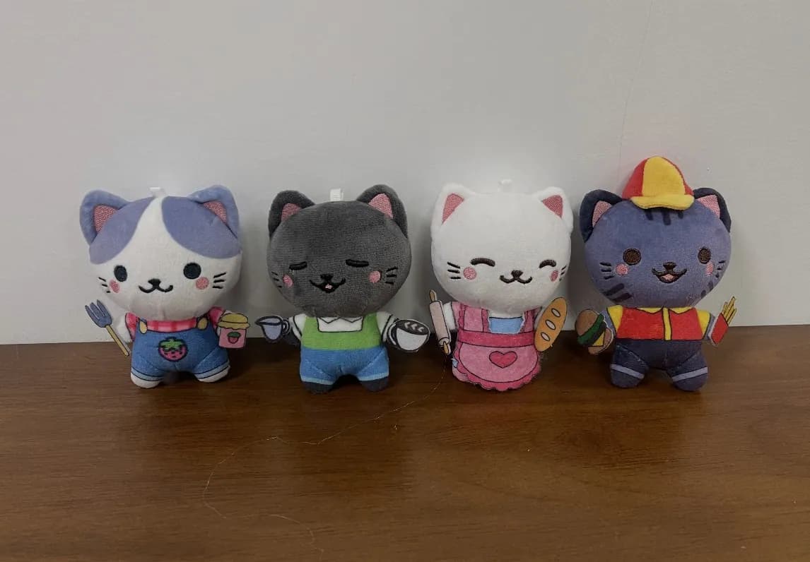 Collectible cat doll series in four different outfits