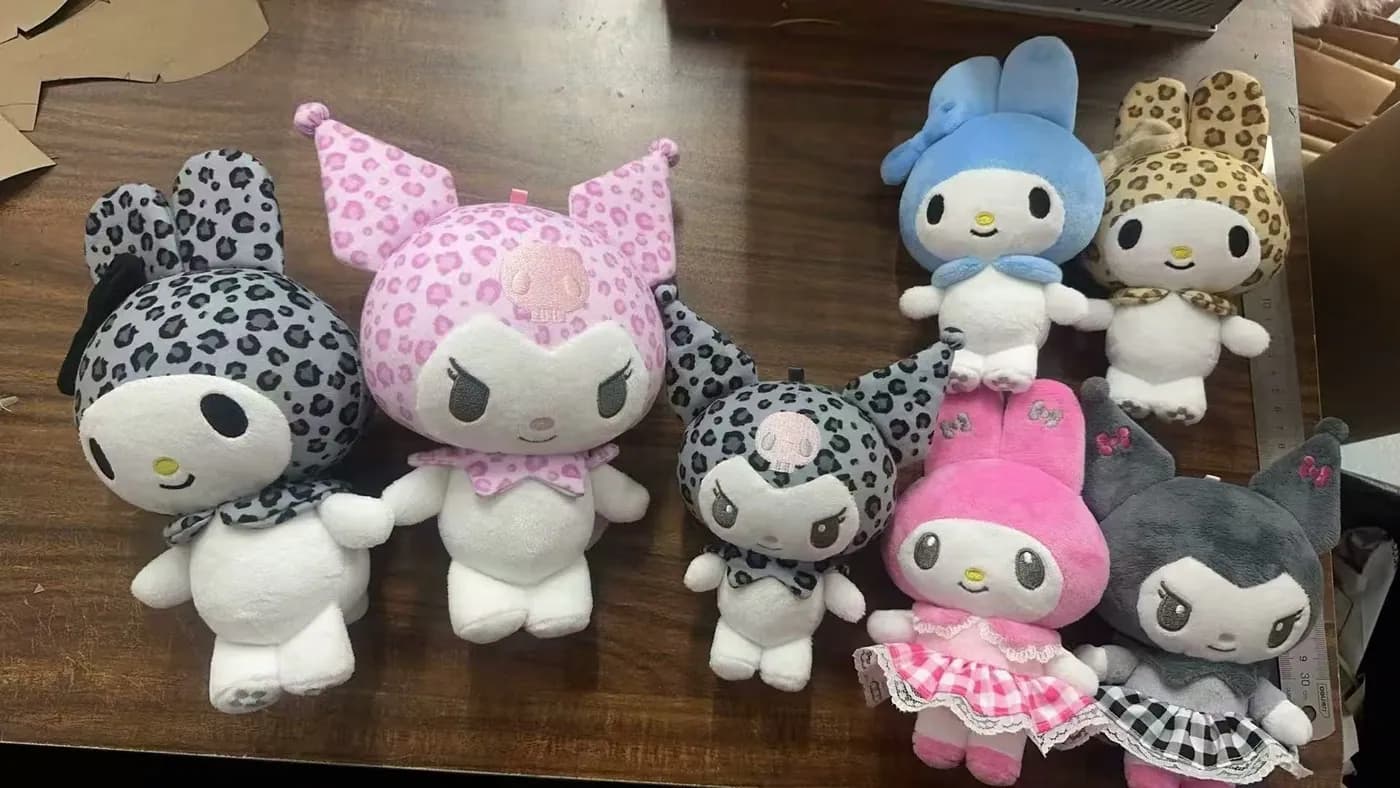 Collectible character plush set in matching printed outfits