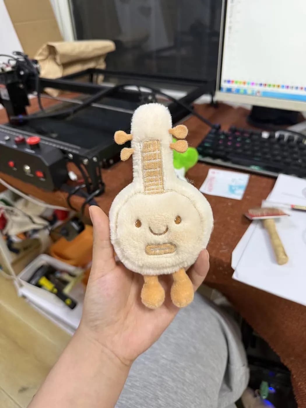 String instrument plush charm with embroidered strings and pegs