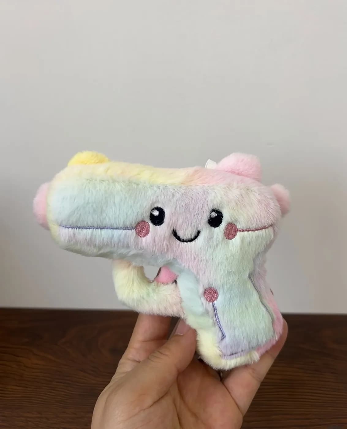Tie-dye character plush in printed rainbow fabric